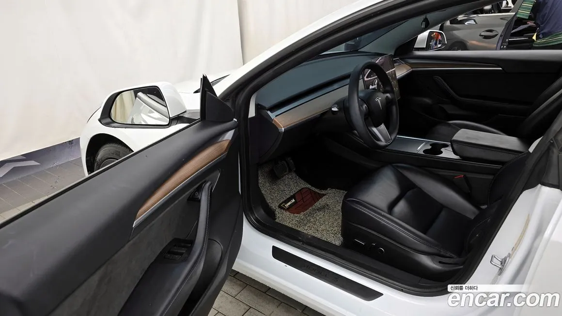 Tesla Model 3 — фото 10