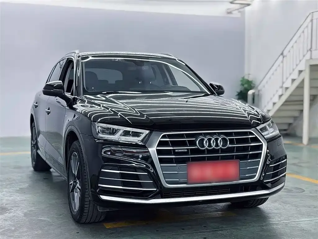 Audi Q5L — фото 6