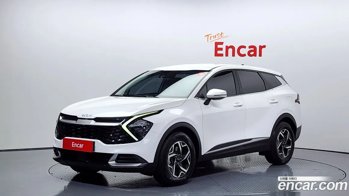 Kia Sportage — фото 1