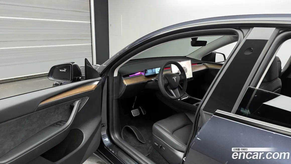 Tesla Model Y — фото 10