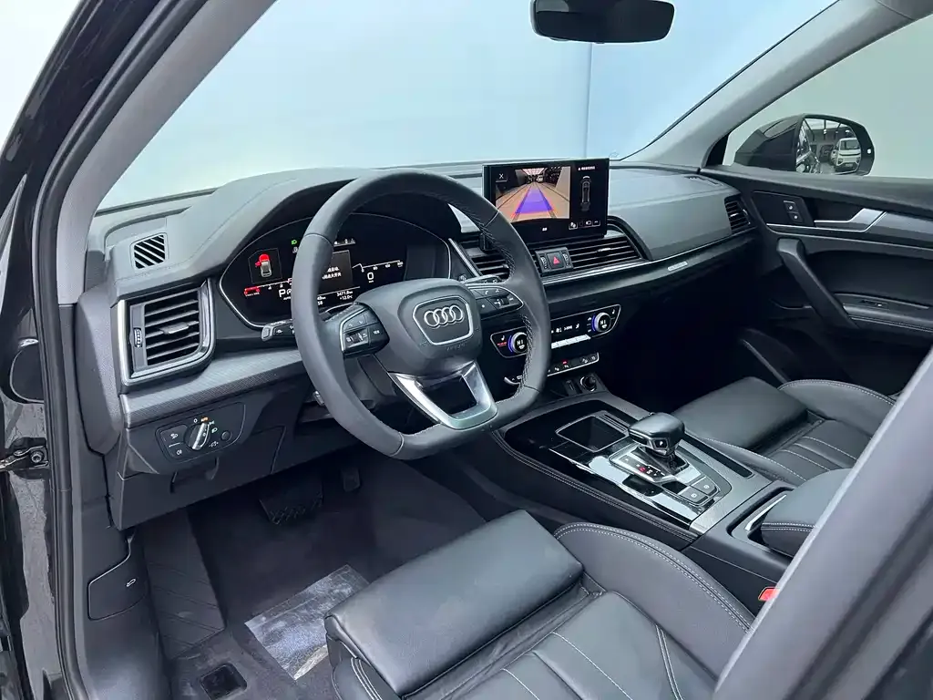 Audi Q5L — фото 9