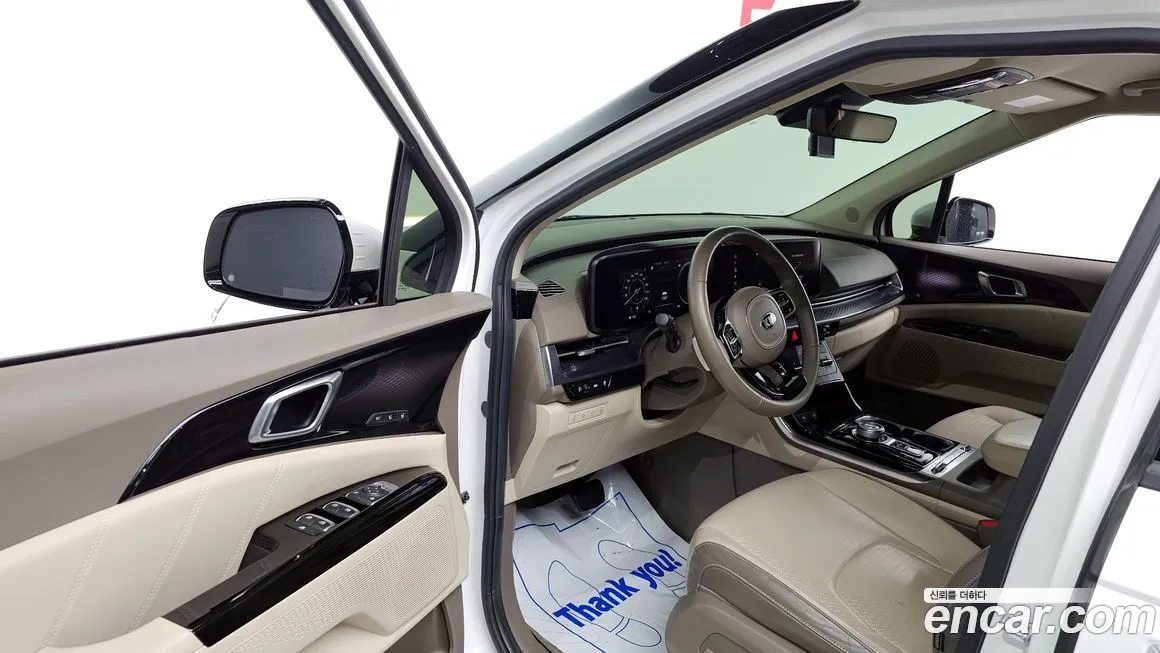 Kia Carnival — фото 10