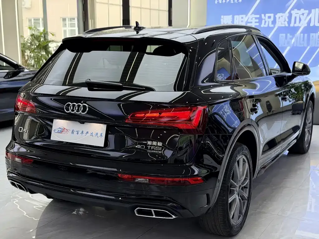 Audi Q5L — фото 10