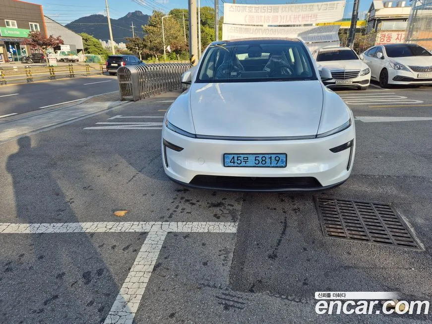 Tesla Model Y — фото 1