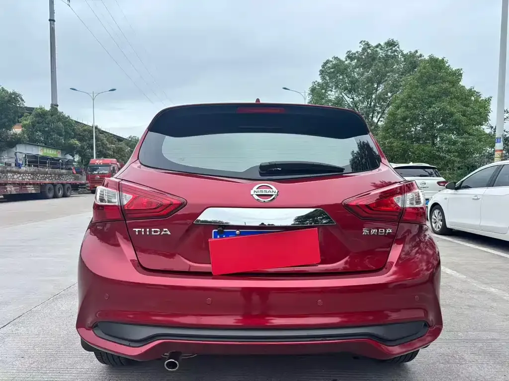 Nissan Tiida — фото 8