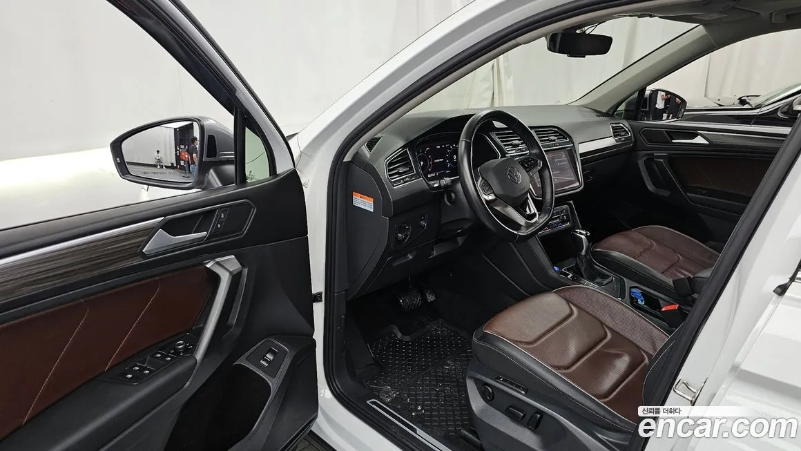 Volkswagen Tiguan — фото 10