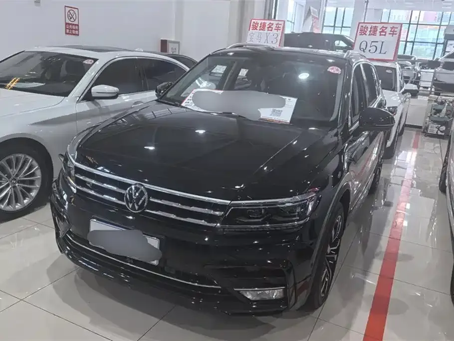 Volkswagen Tiguan L New Energy — фото 1