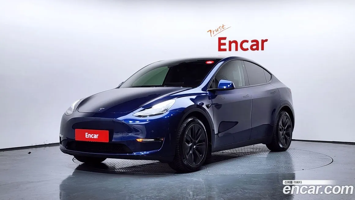 Tesla Model Y — фото 1