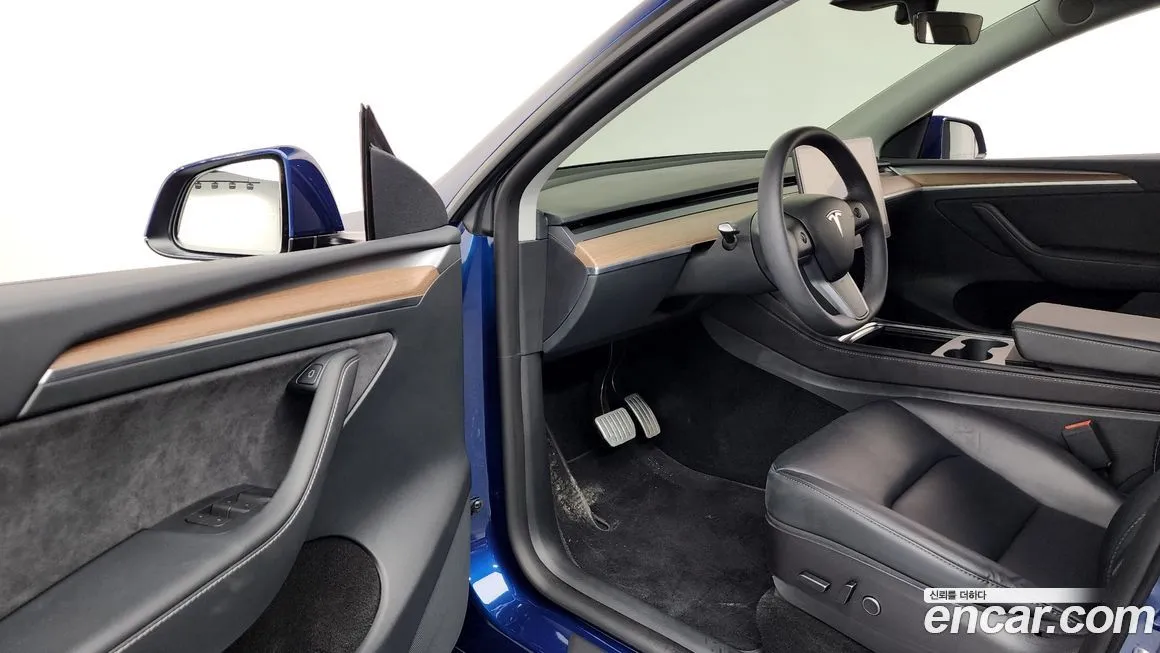 Tesla Model Y — фото 10