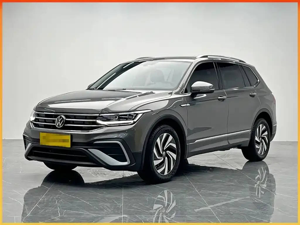 Volkswagen Tiguan L — фото 1