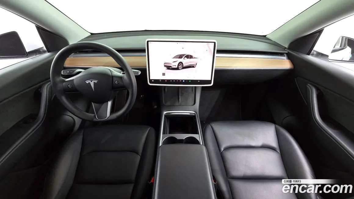 Tesla Model Y — фото 7
