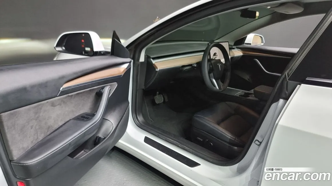 Tesla Model 3 — фото 10