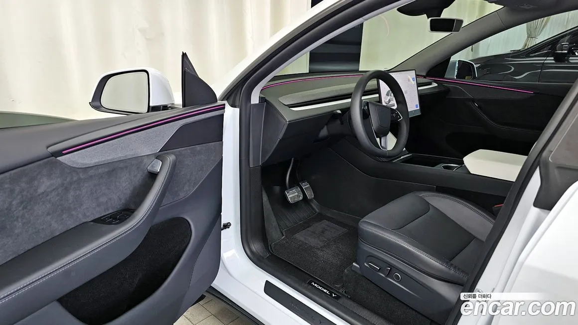 Tesla Model Y — фото 10
