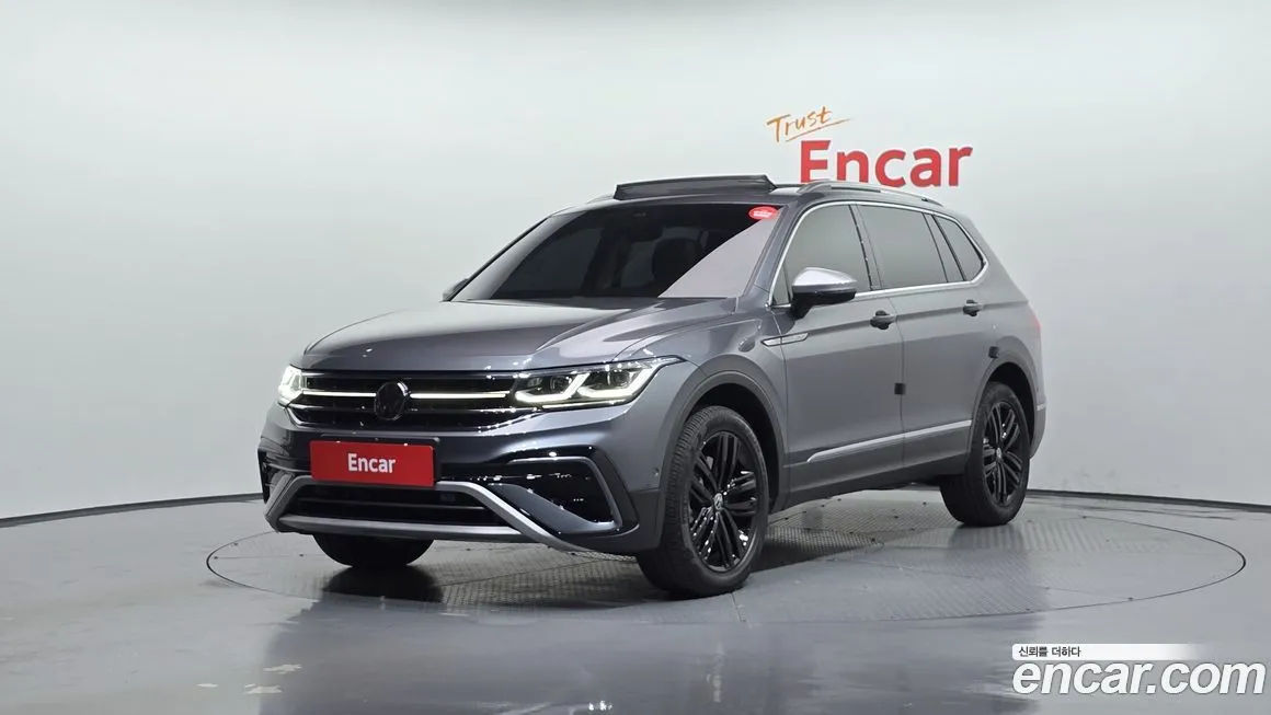 Volkswagen Tiguan — фото 1