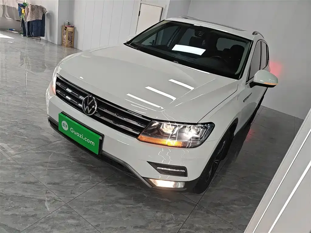 Volkswagen Tiguan L — фото 2