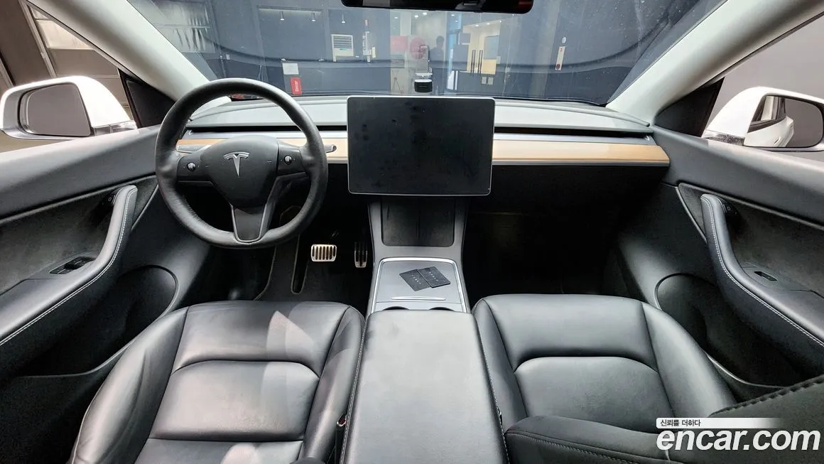 Tesla Model Y — фото 7
