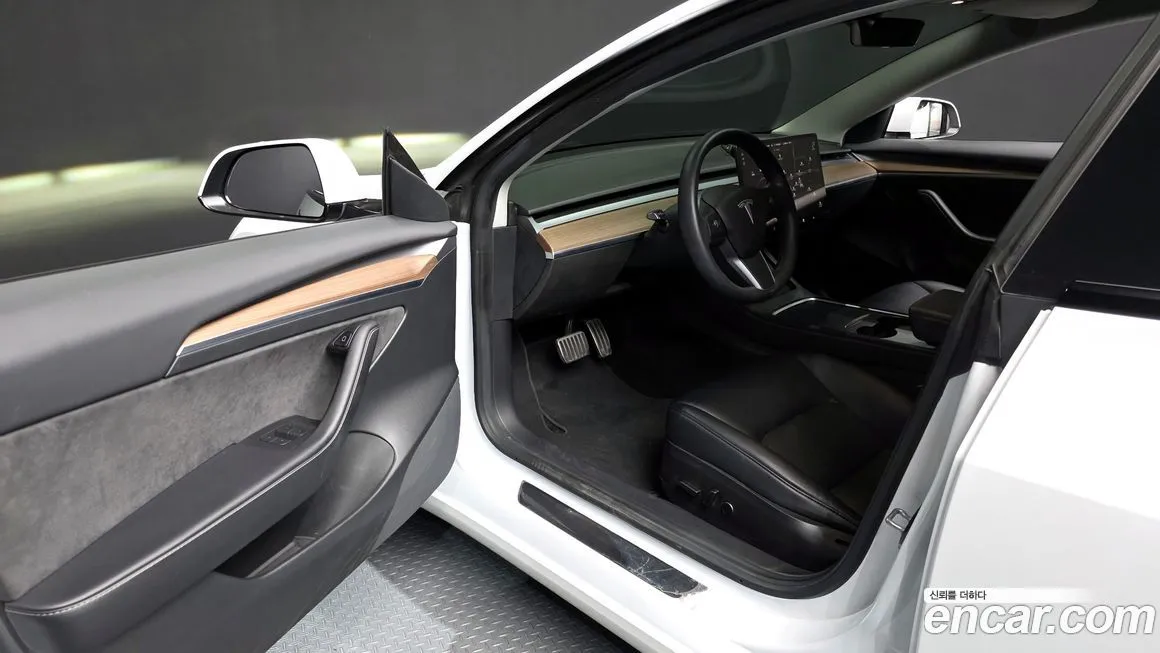 Tesla Model 3 — фото 10