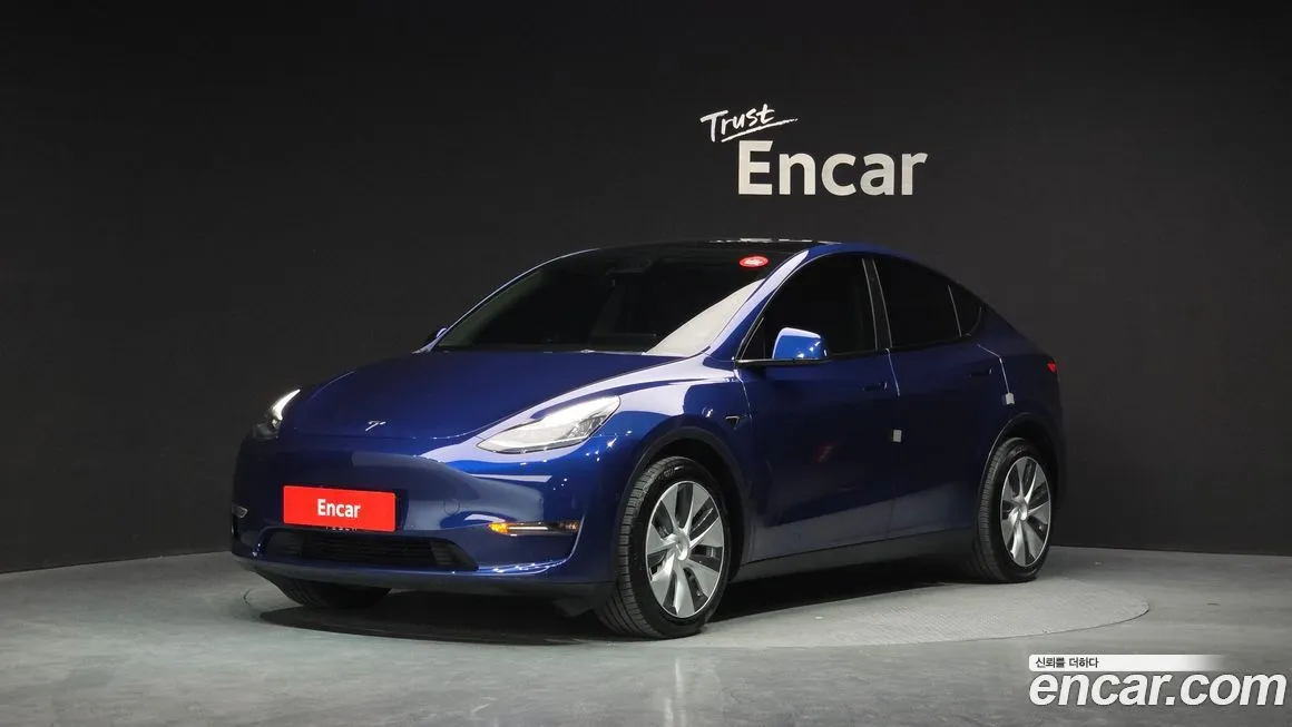 Tesla Model Y — фото 1