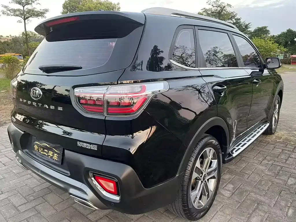 Kia Sportage — фото 7
