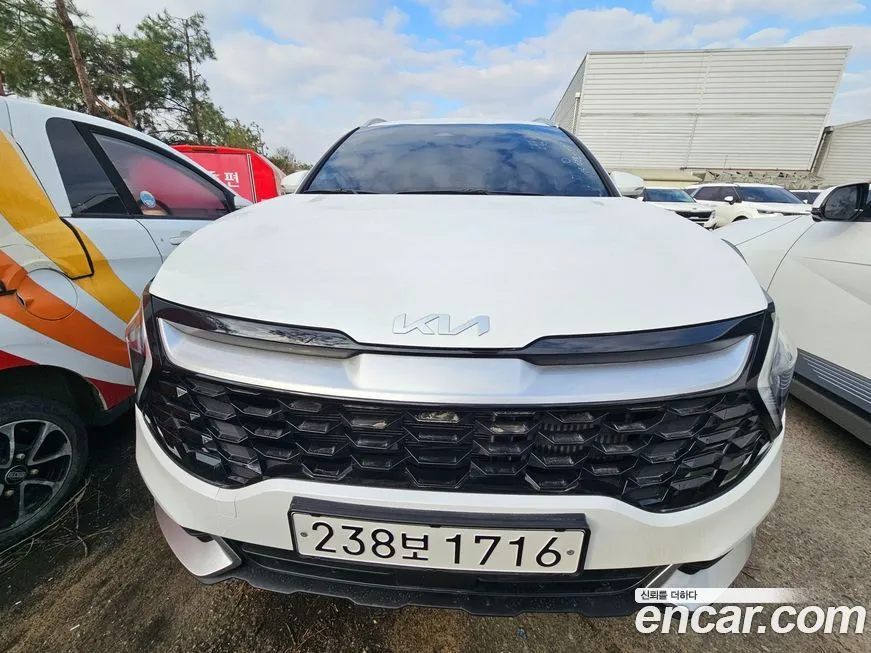 Kia Sportage — фото 1