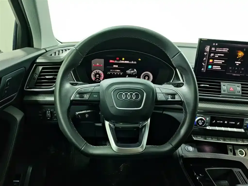 Audi Q5L — фото 10