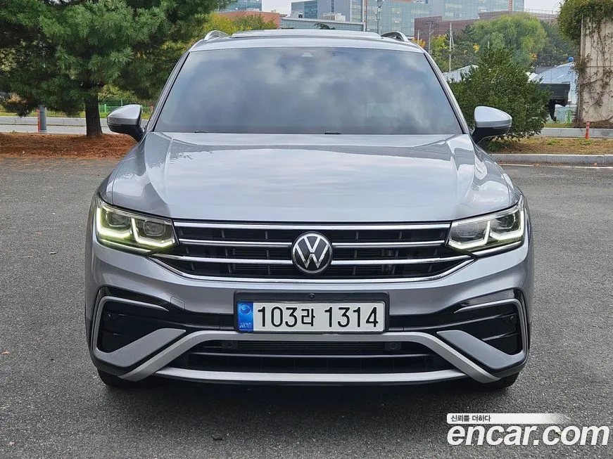 Volkswagen Tiguan — фото 1