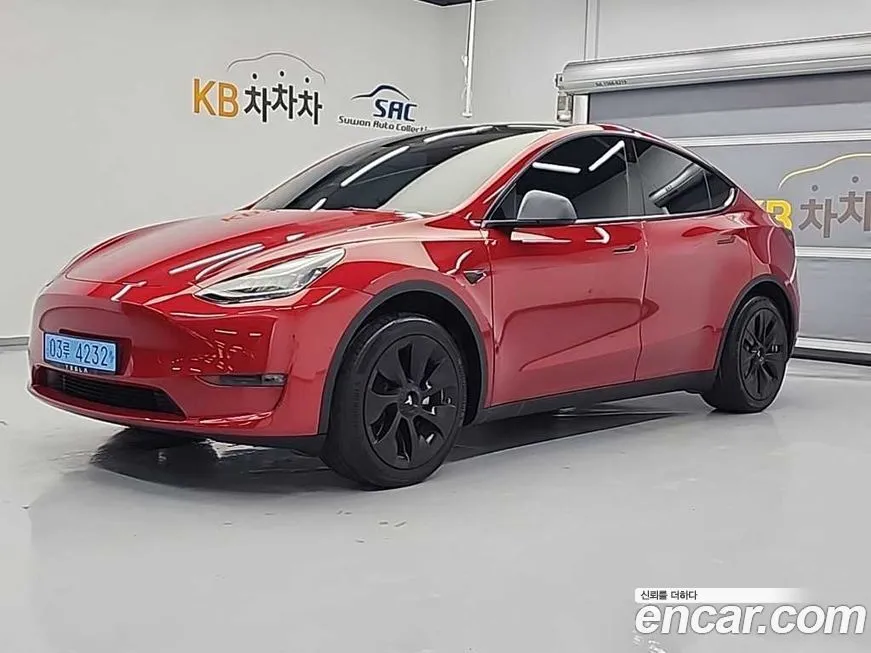 Tesla Model Y — фото 1