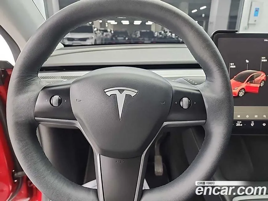 Tesla Model Y — фото 9