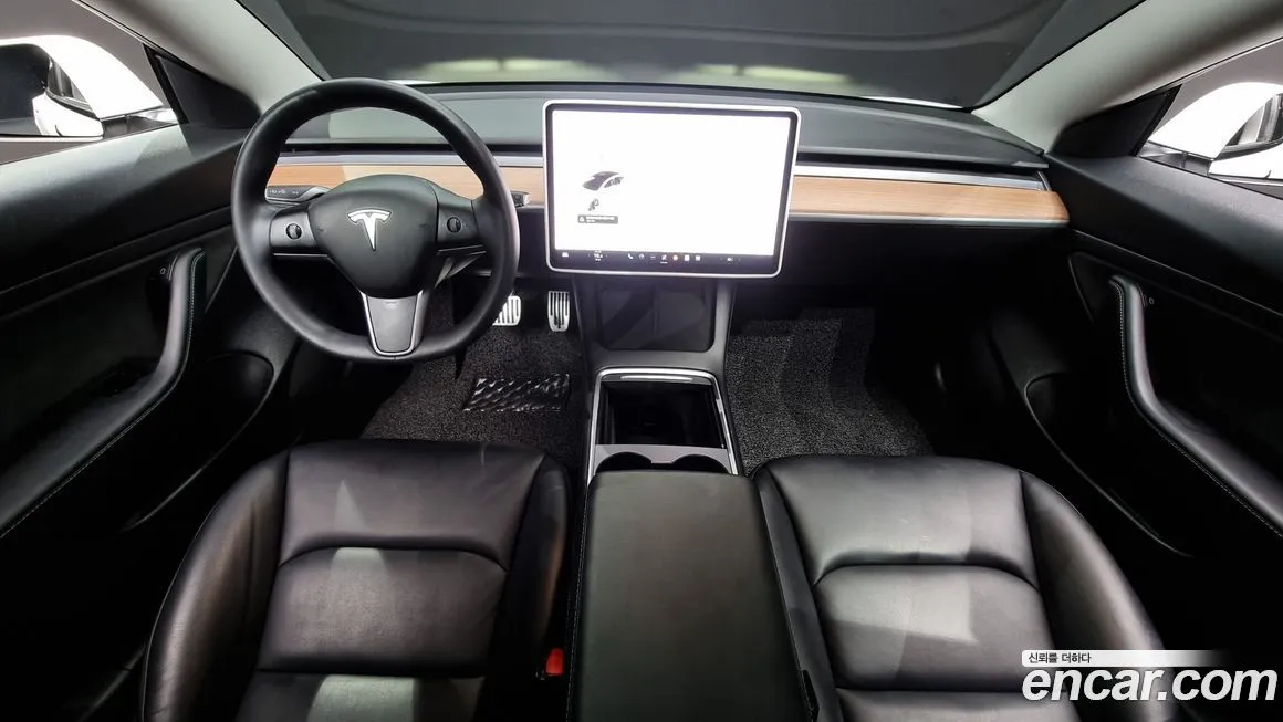 Tesla Model 3 — фото 7