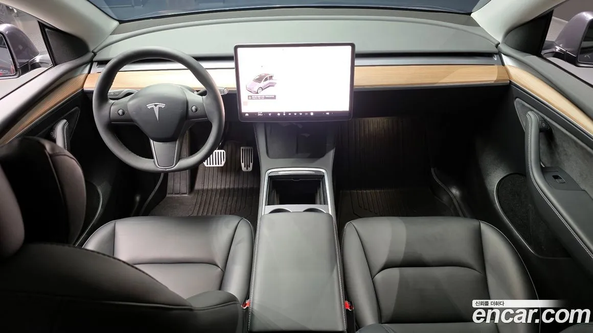Tesla Model Y — фото 7