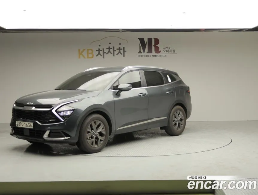 Kia Sportage — фото 1