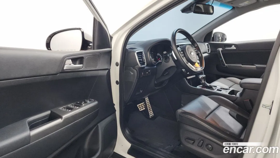 Kia Sportage — фото 10