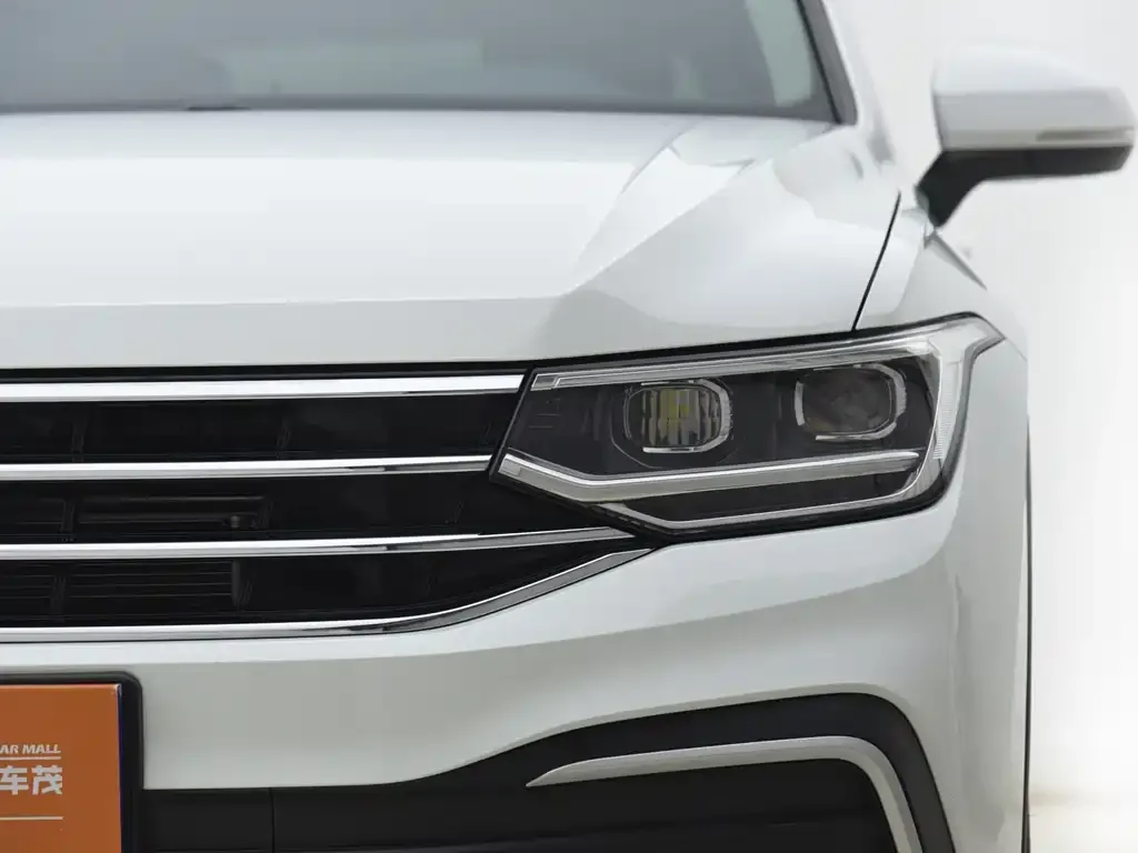 Volkswagen Tiguan L — фото 3
