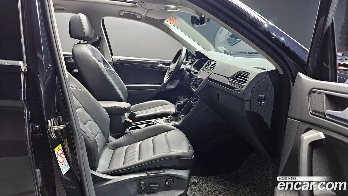 Volkswagen Tiguan — фото 10