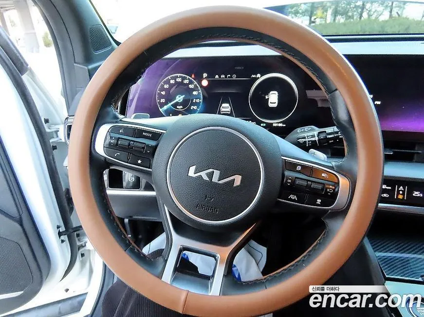 Kia Sportage — фото 10