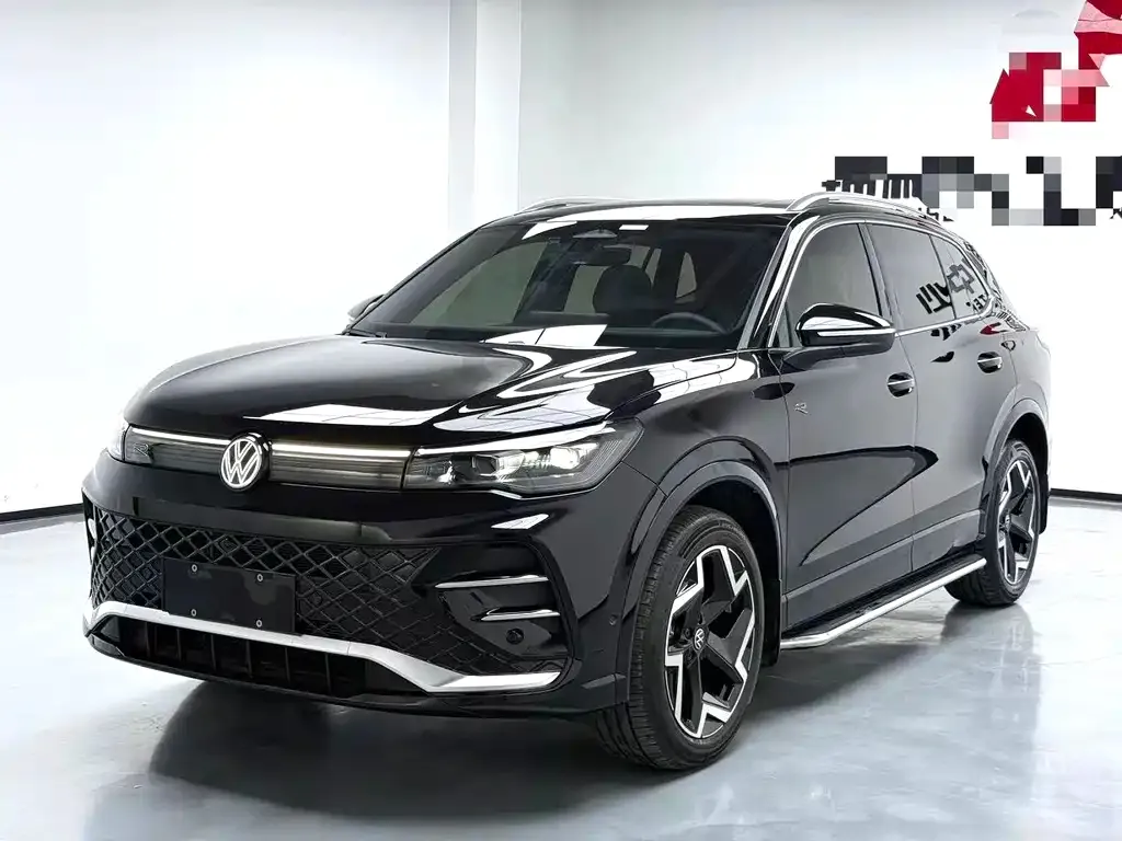 Volkswagen Tiguan L — фото 1