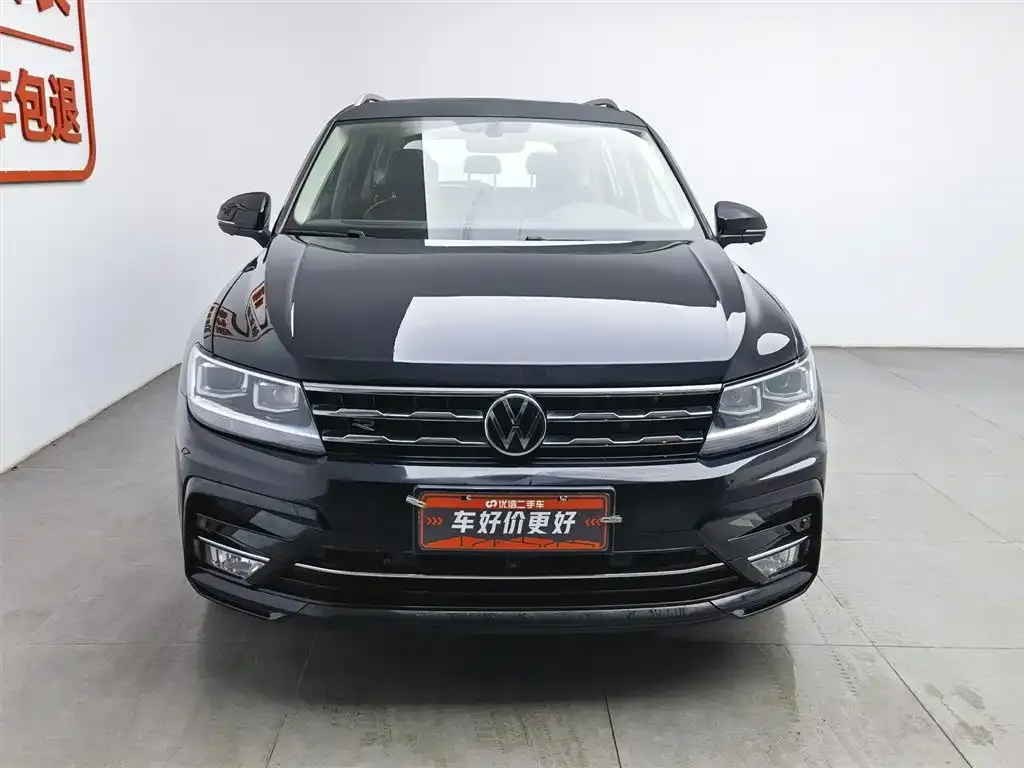 Volkswagen Tiguan L — фото 3