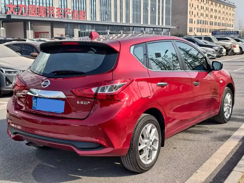 Nissan Tiida — фото 10