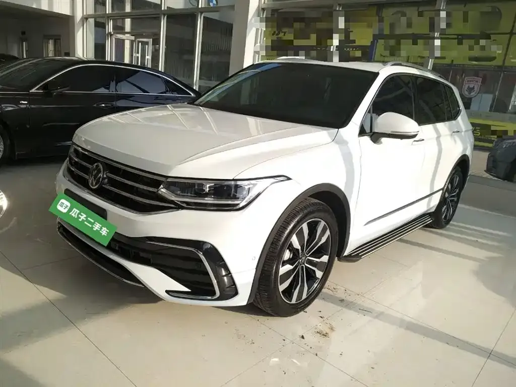 Volkswagen Tiguan L — фото 2