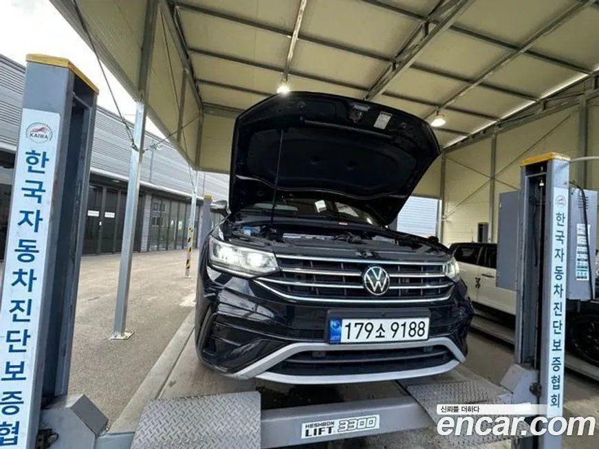 Volkswagen Tiguan — фото 1