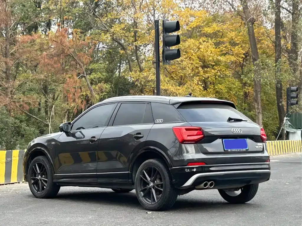 Audi Q2L — фото 5