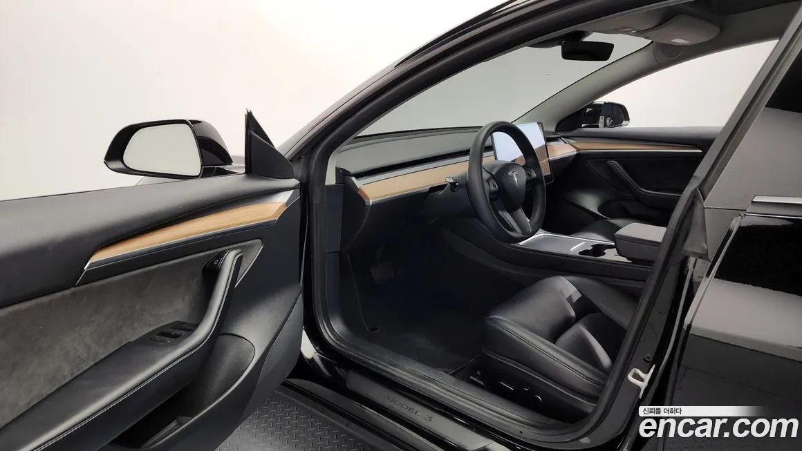 Tesla Model 3 — фото 10