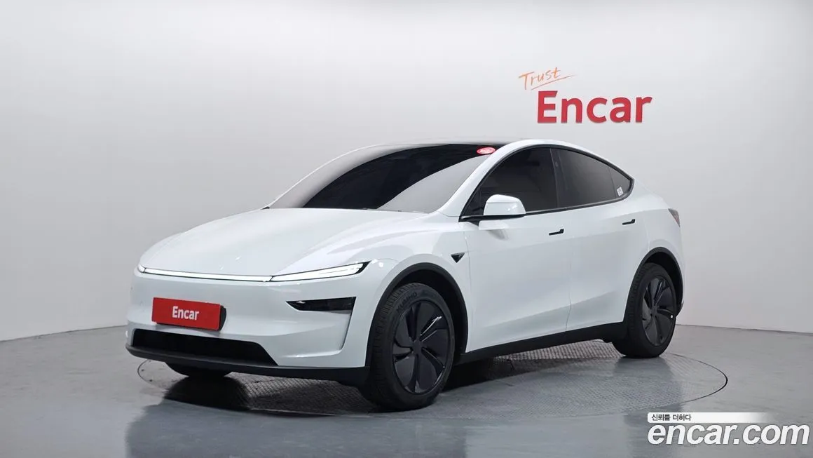 Tesla Model Y — фото 1