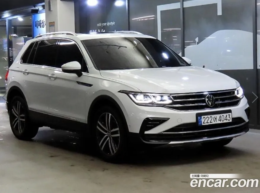 Volkswagen Tiguan — фото 1