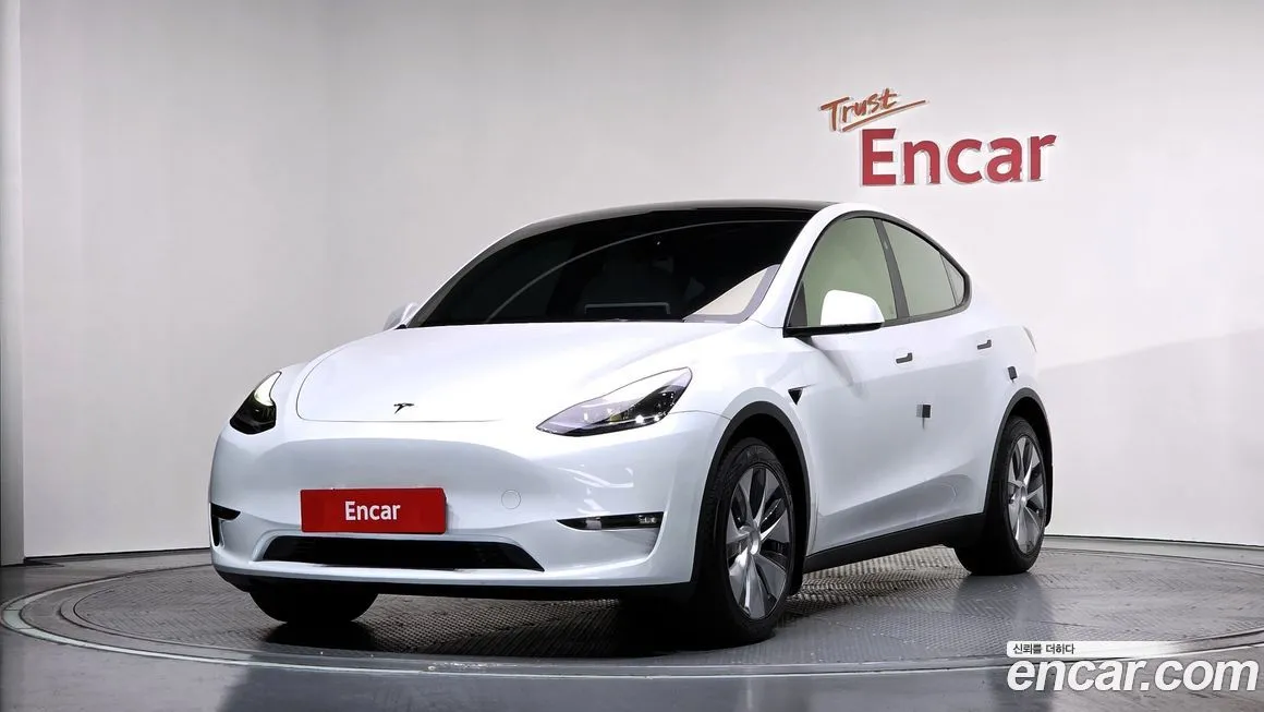 Tesla Model Y — фото 7