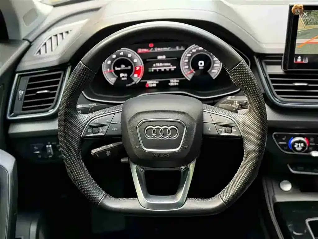 Audi Q5L — фото 6