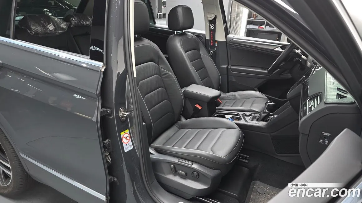 Volkswagen Tiguan — фото 10