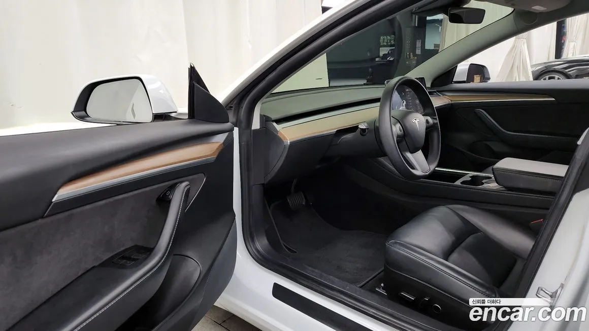 Tesla Model 3 — фото 10