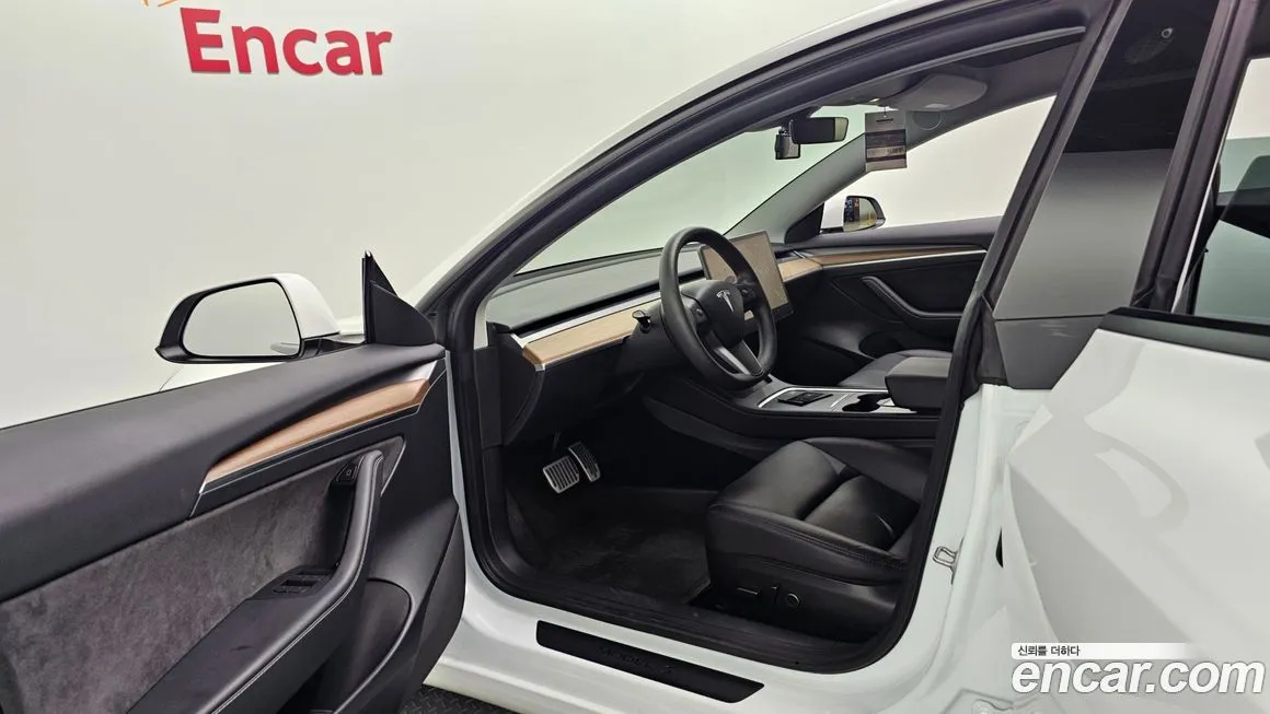 Tesla Model 3 — фото 10