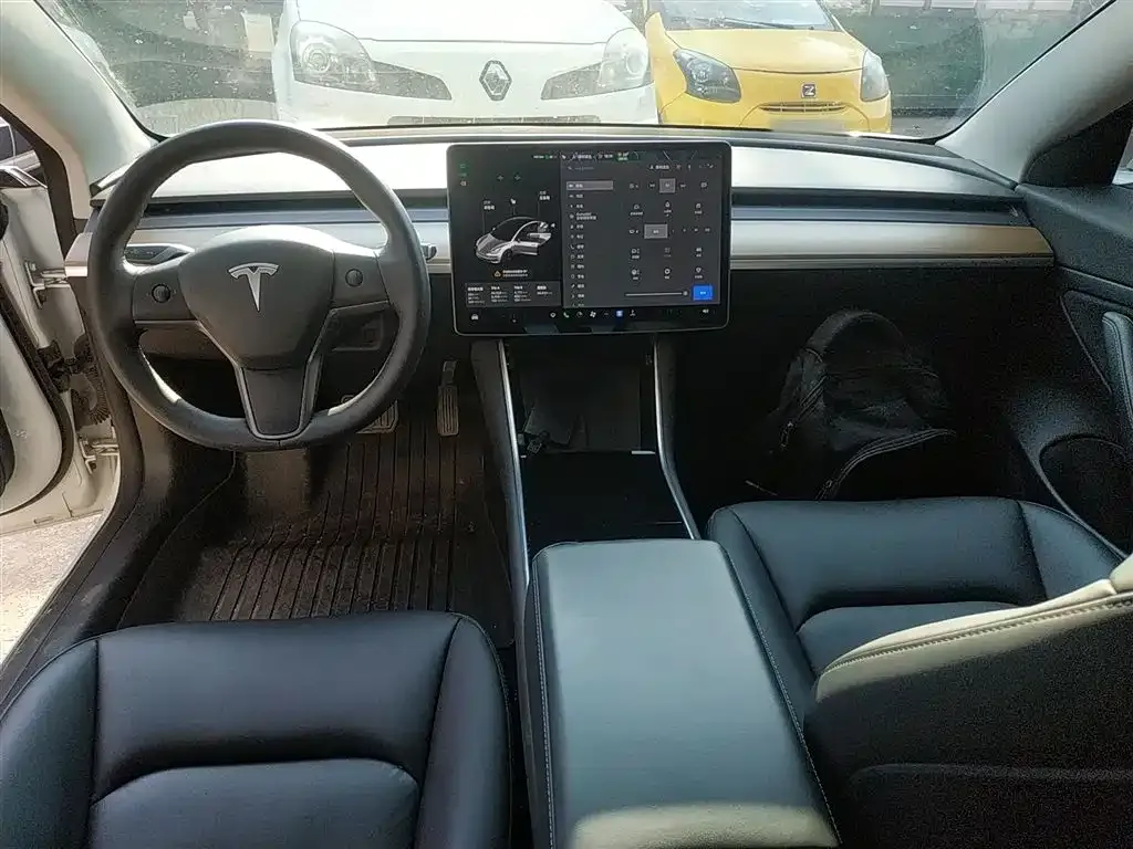 Tesla Model 3 — фото 10